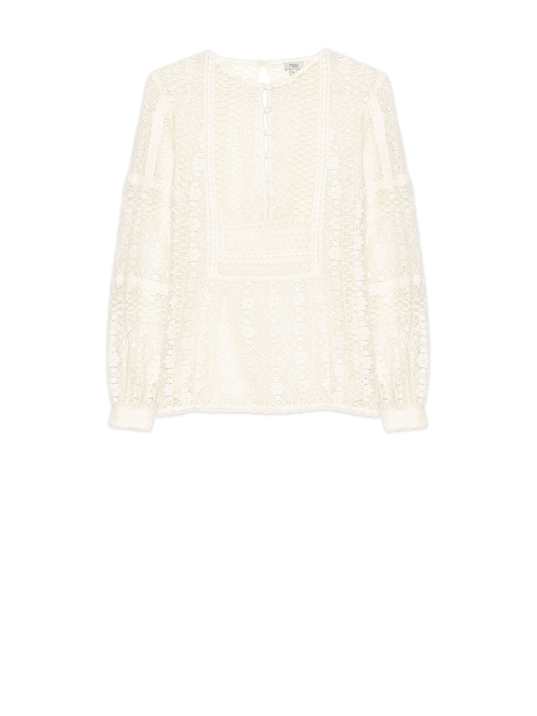 Blusa transparente confeccionada en algodón y nylon con un diseño de encaje mezclado con calados de inspiración victoriana romántica mezclado con un estilo folk campestre.